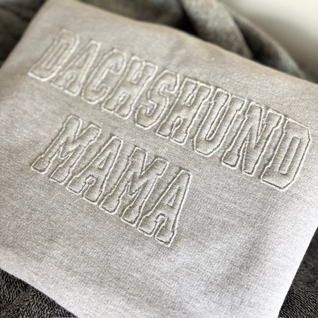 Grae fabric with 'DACHSHUND MAMA' embroidery.