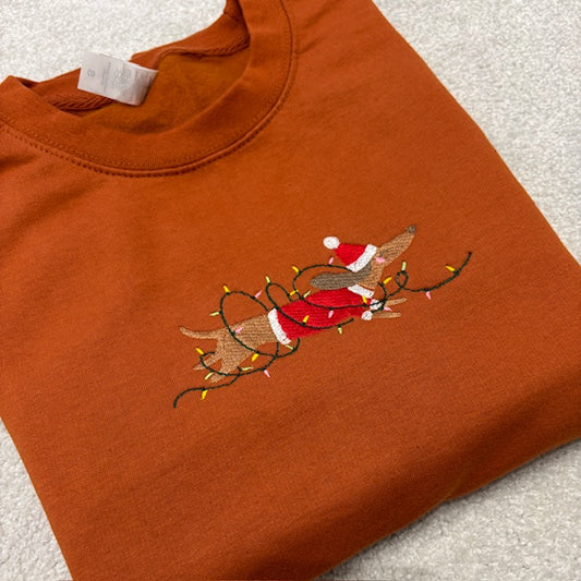 Embroidered sweatshirt with Christmas-themed Dachshund 