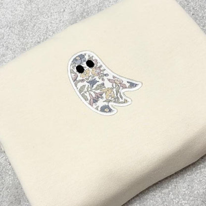 Liberty Fabric floral ghost appliqued onto a cream coloured sweatshirt.