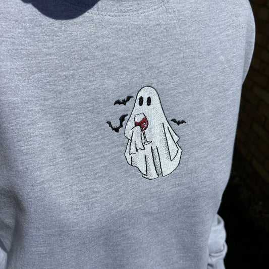 Grey sweatshirt with a ghost holding a wine glass design embroidery.