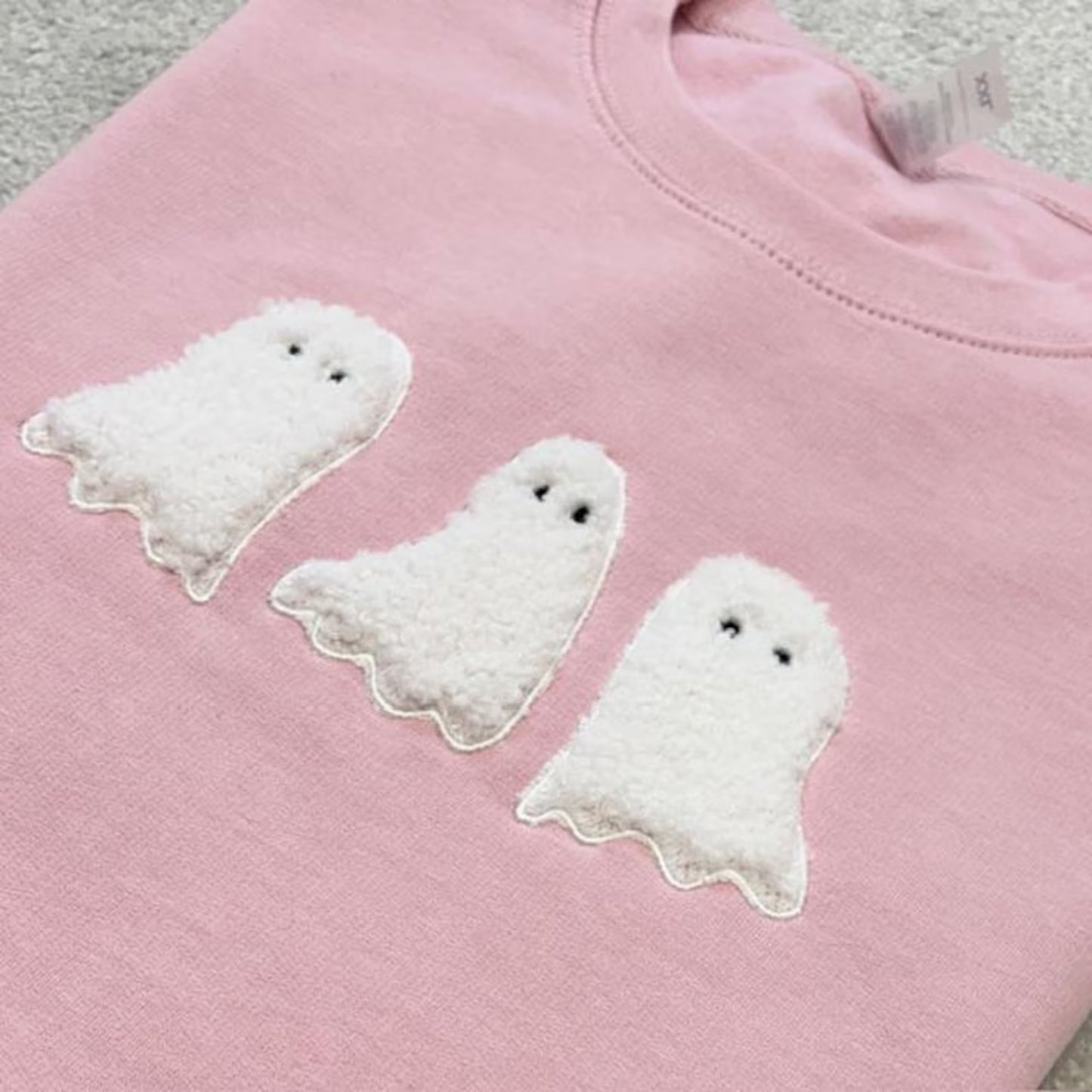 Pink sweatshirt with white ghost trio appliqued
