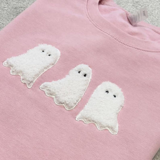 Pink sweatshirt with white ghost trio appliqued
